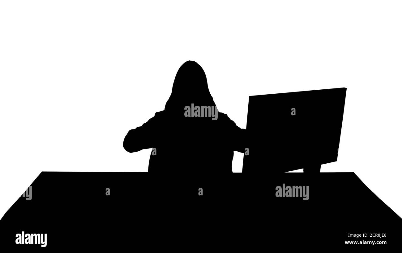 Silhouette betonte müde aus der Arbeit Hacker Blick auf pc monit Stockfoto