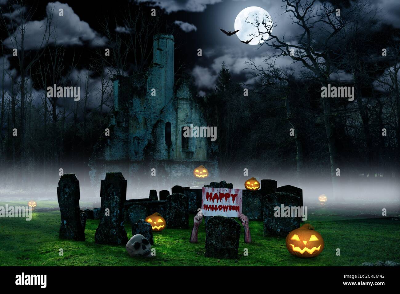 Ein halloween Hintergrund mit einem Friedhof mit Kürbissen und ein Burg Stockfoto