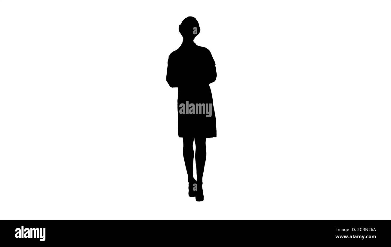 Silhouette Frau Doktor Ingenieur gehen mit digitalen Tablet. Stockfoto