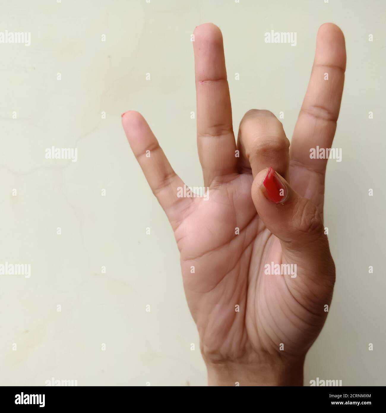 Gebärdensprache, EINE Collage der amerikanischen Zeichensprache Nummer 8, acht von Dame Hand isoliert auf weißem Hintergrund. Stockfoto