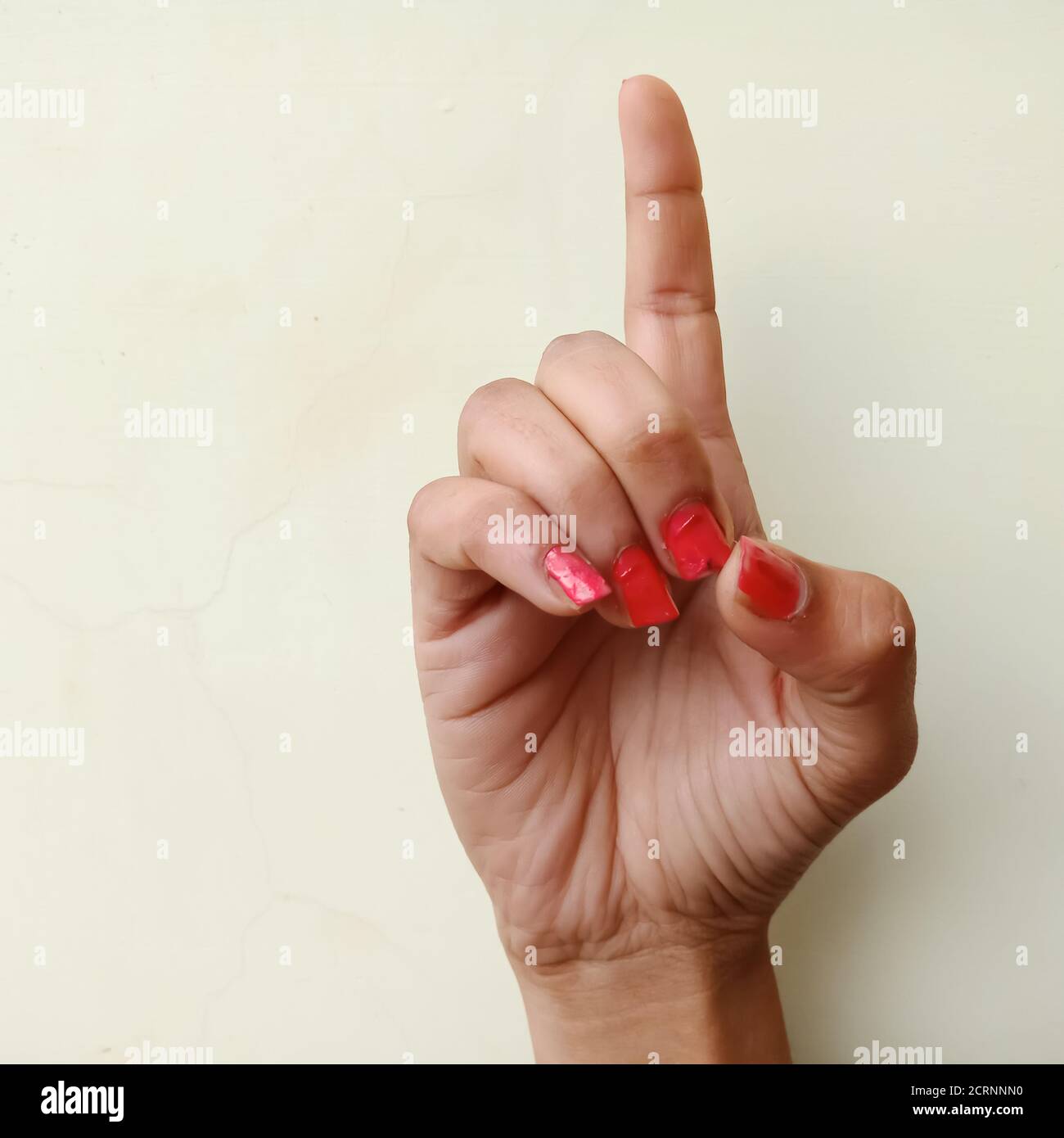 Gebärdensprache, EINE Collage des amerikanischen Zeichens D von weiblicher Hand isoliert auf weißem Hintergrund. Stockfoto