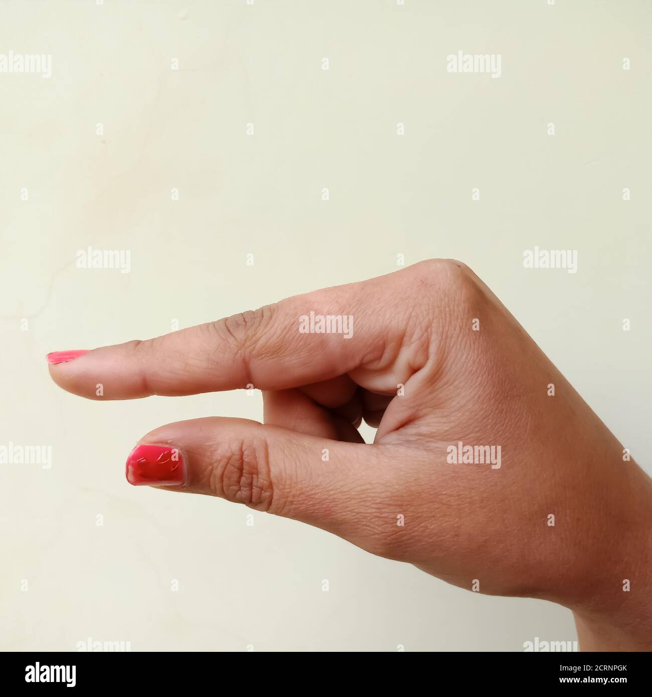 Gebärdensprache, EINE Collage aus dem amerikanischen Gebärdensprache-Alphabet G von weiblicher Hand isoliert auf weißem Hintergrund. Stockfoto