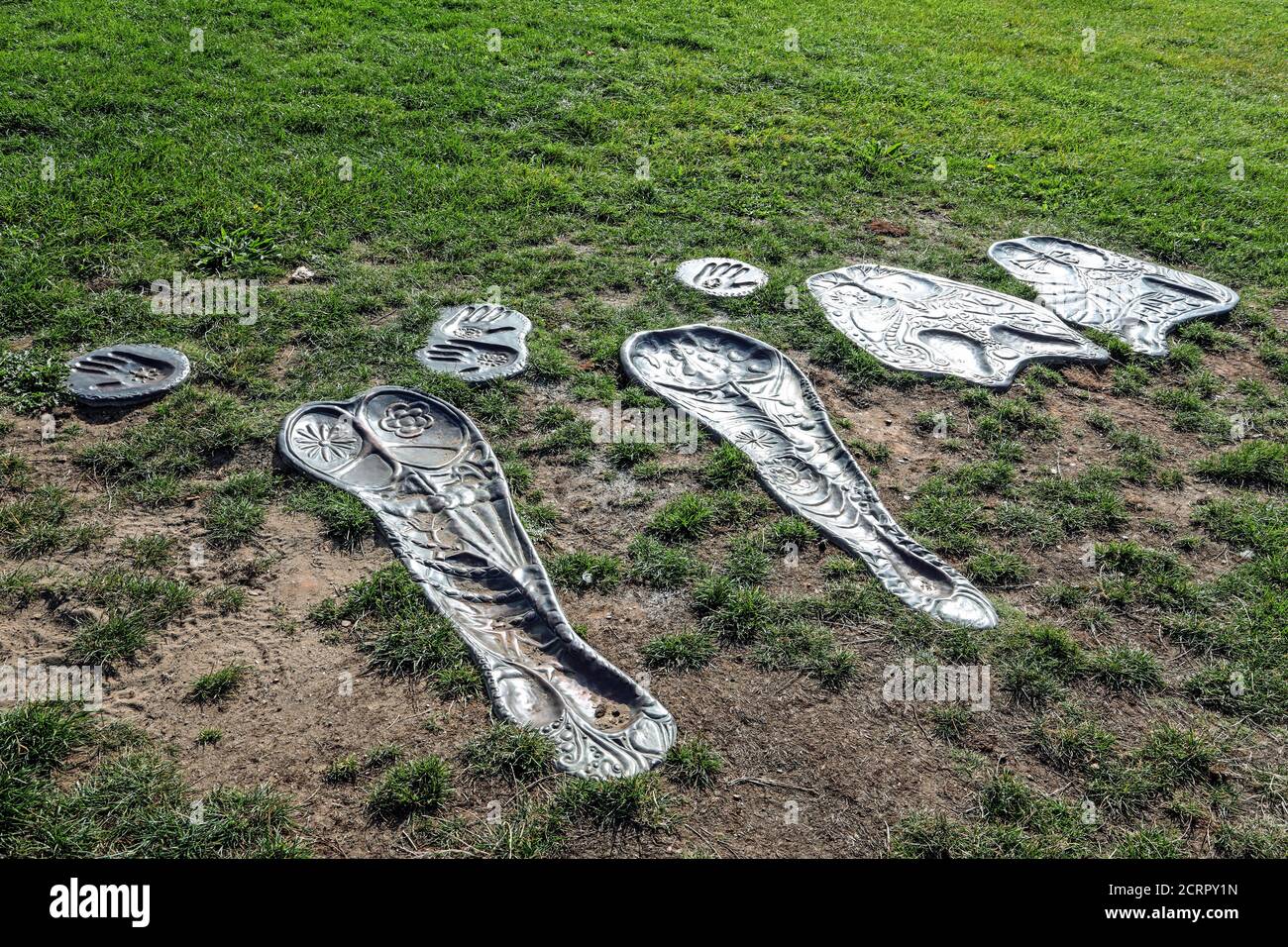 Ein Tribut Kupferguss Kunstwerk erinnert an einen Besuch von den Beatles zu Plymouth Hoe. Die Fab vier Katze für ein Presseschießen während ihrer Tour Dreharbeiten die M Stockfoto