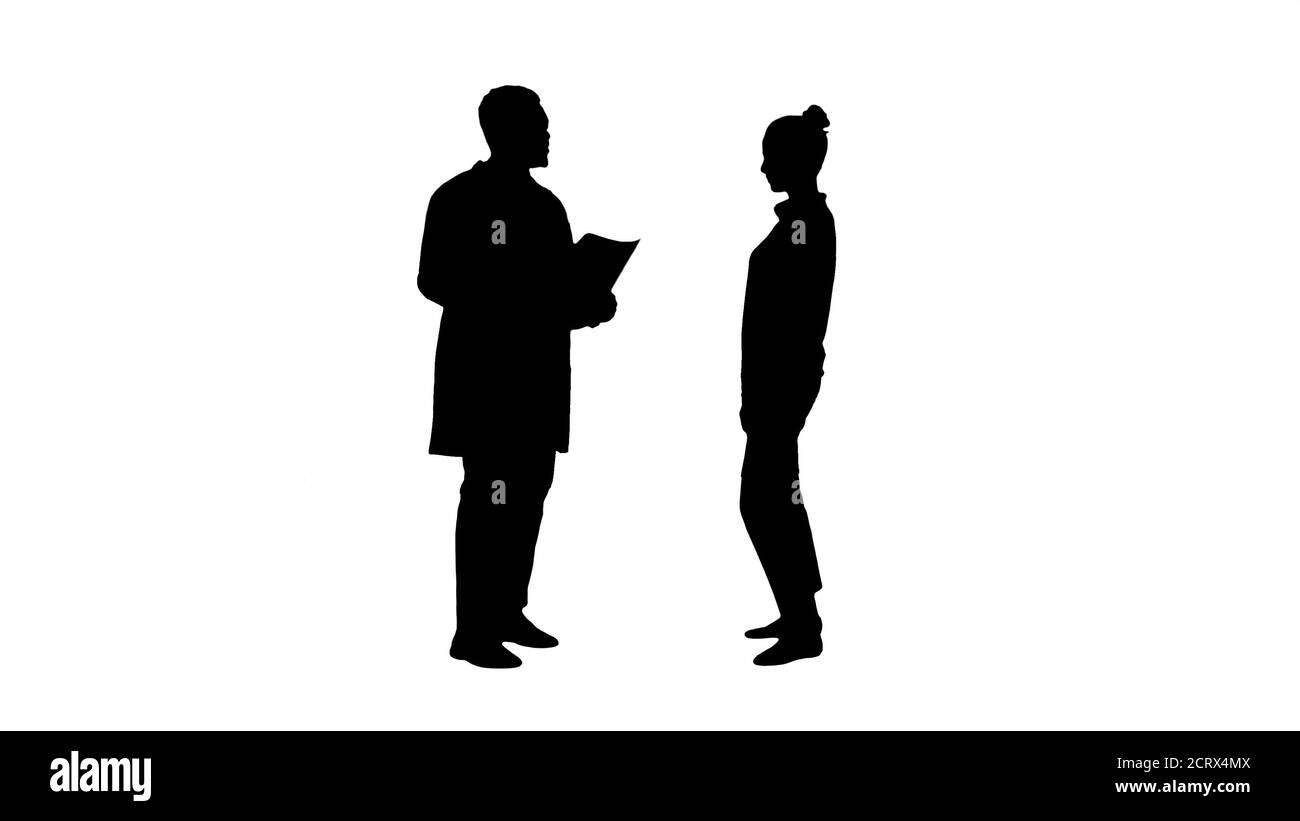 Silhouette Arzt zeigt einem Patienten die Röntgenergebnisse. Dann p Stockfoto