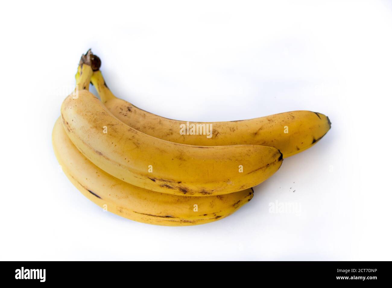 Drei ecuatorianische Bananen auf weißem Hintergrund Stockfoto