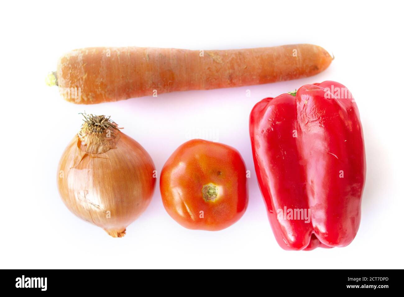 Eine Tomate eine Karotte eine Zwiebel ein süßer Pfeffer Stockfoto