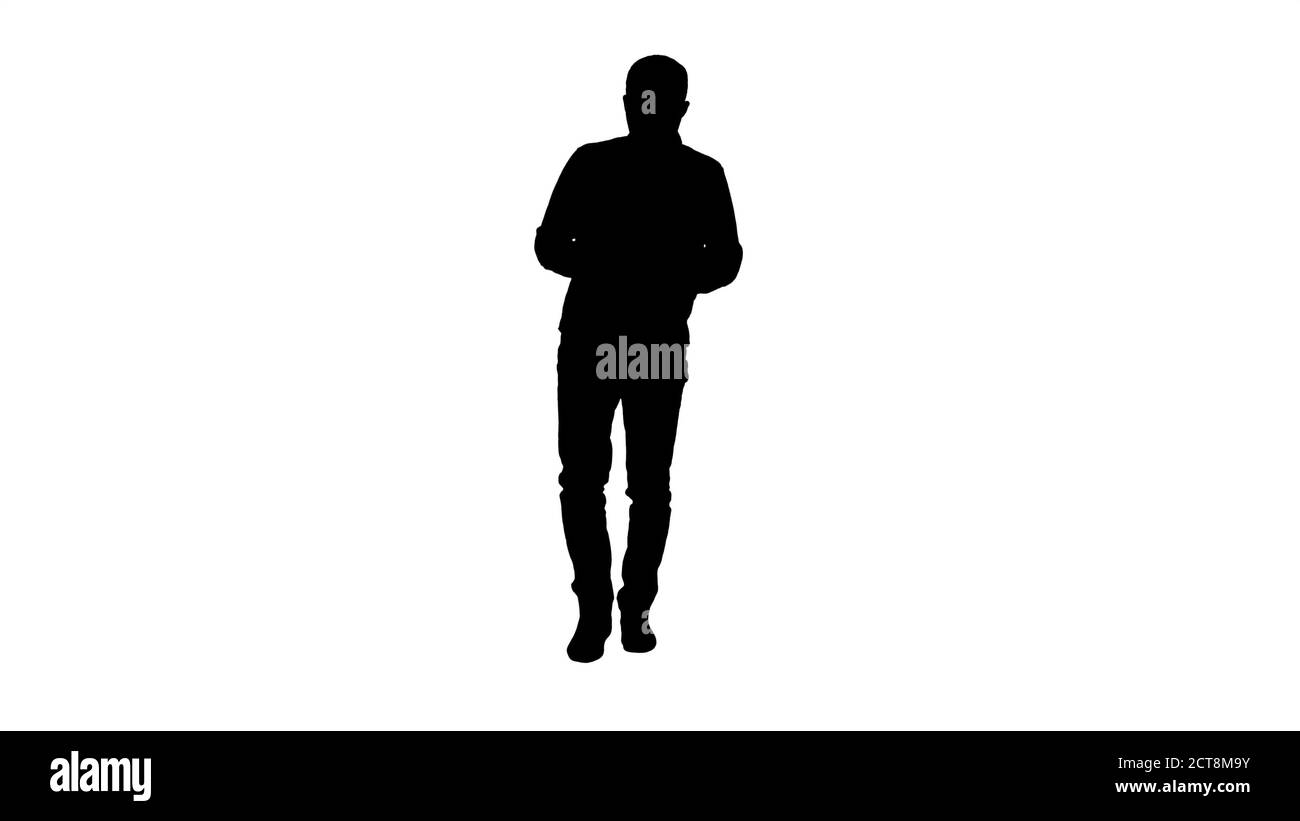 Silhouette ein Kerl halten und mit einem weißen Tablet. Stockfoto