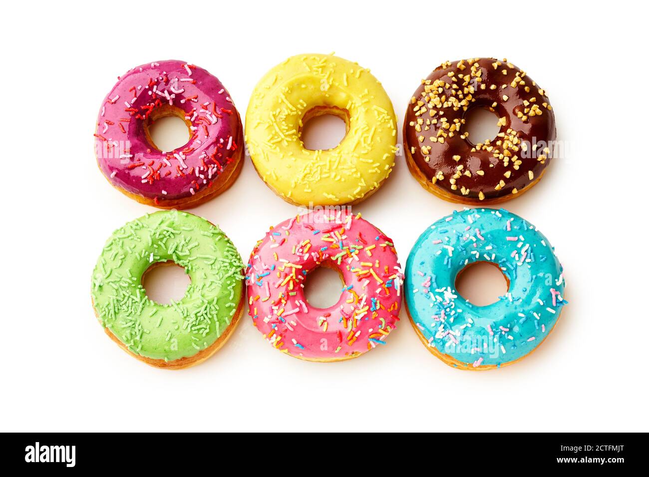 Süße bunte glasierte Donuts von oben auf weißem Hintergrund. Junk Food Draufsicht, Zucker zu behandeln Stockfoto