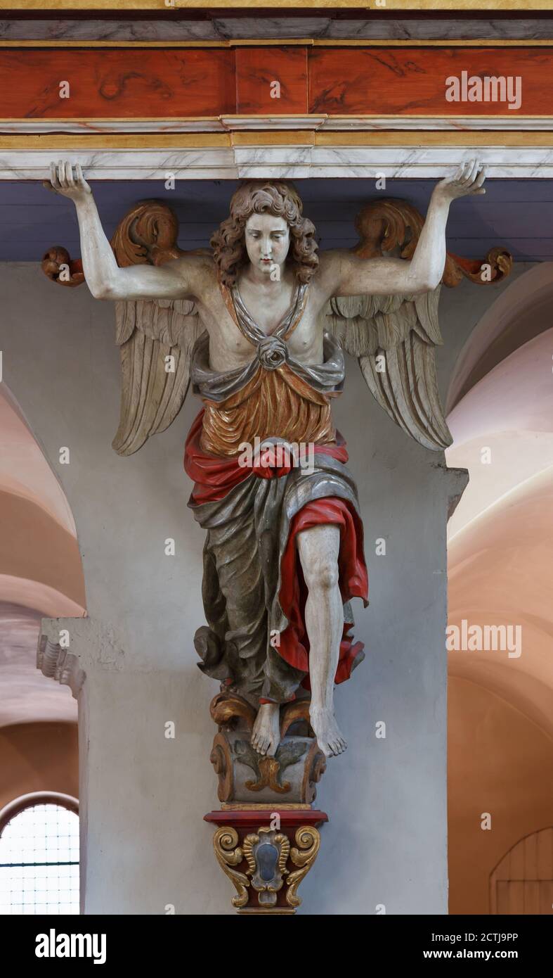 Supporter Statue - Detail des Orgellofts in der Basilika St. Stephanus und St. Vitus im Kloster Corvey Stockfoto