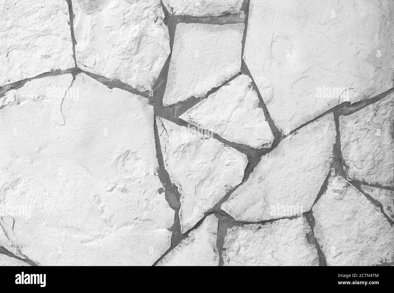 Hintergrund der weißen gebrochenen Stein Wand Textur Stockfoto