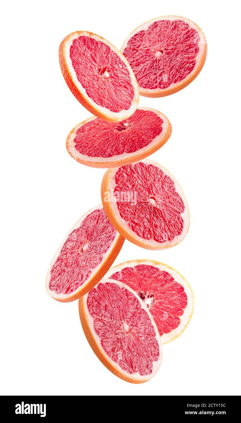 Fallende Grapefruitscheiben isoliert auf weißem Hintergrund. Stockfoto