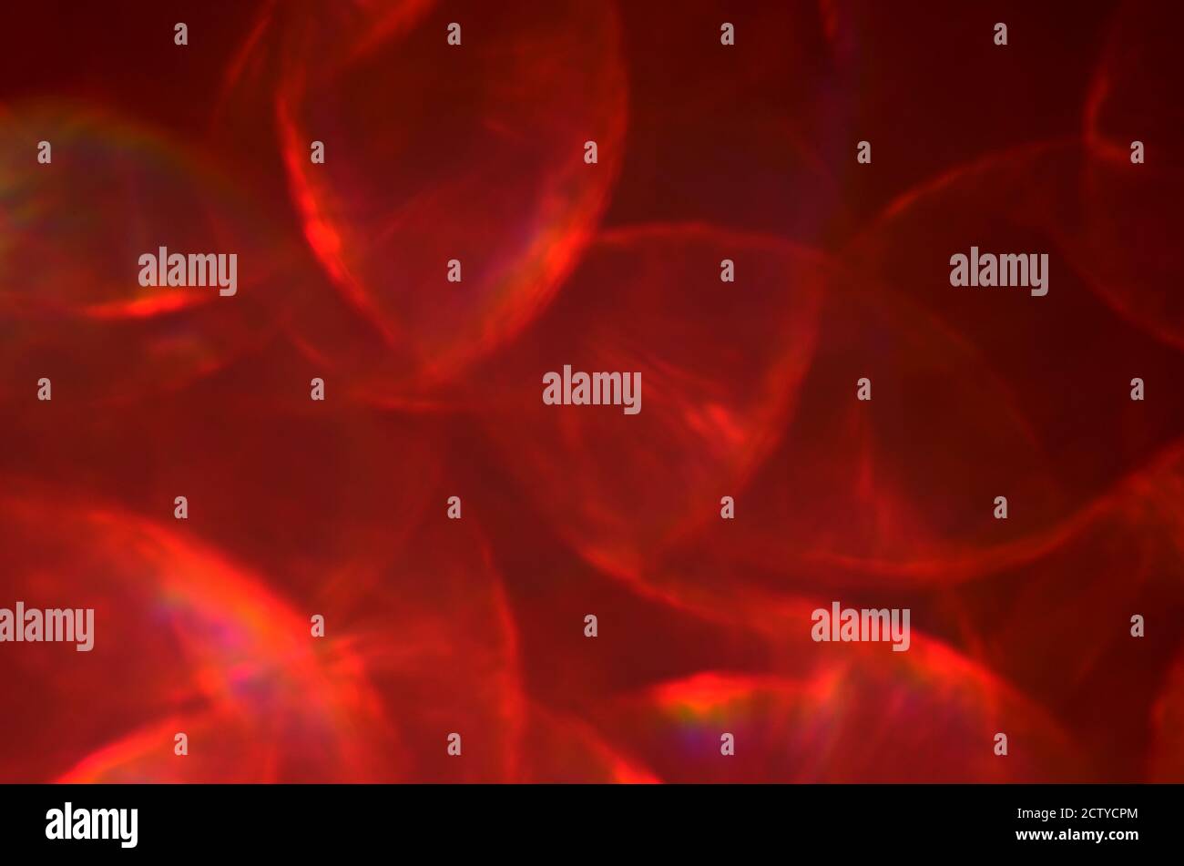Rot glühender defokussierte abstrakte Hintergrund mit Kopierraum Stockfoto