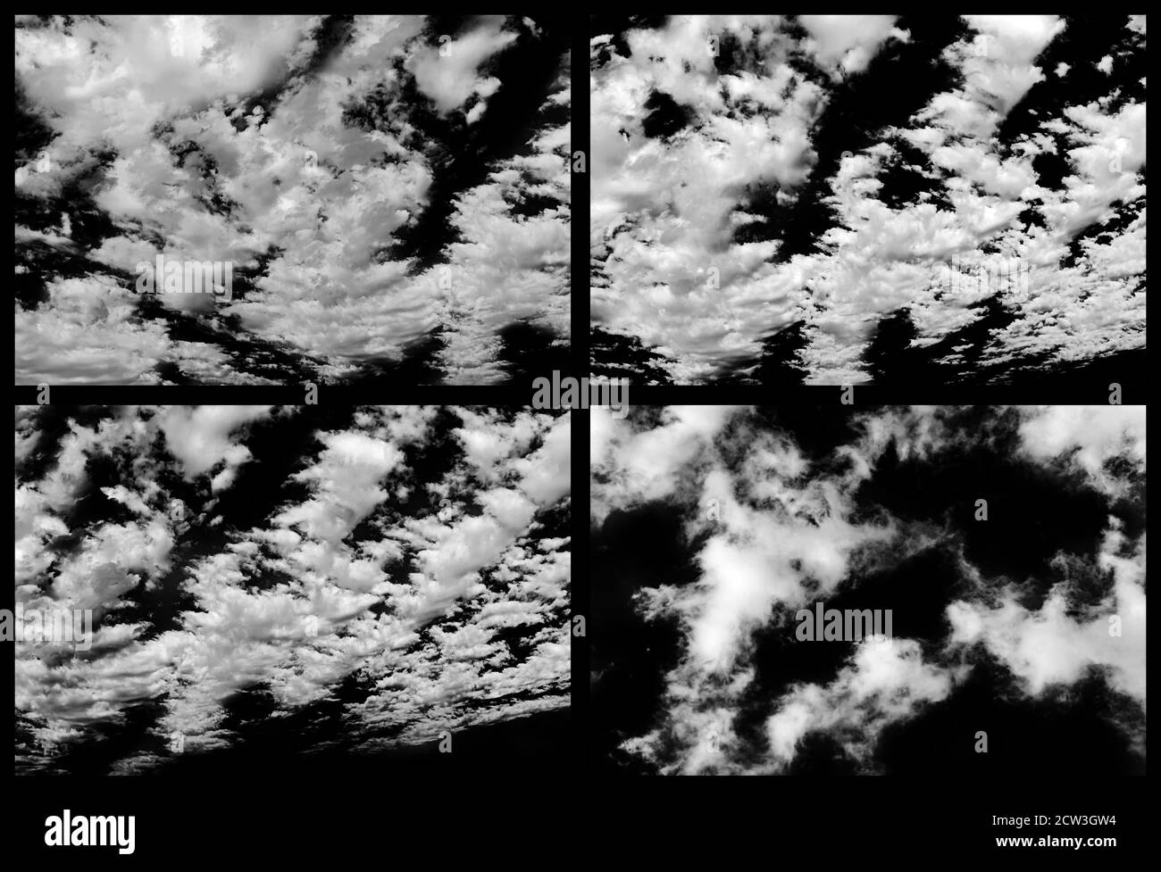 Set von weißen Wolken isoliert auf schwarzem Hintergrund Stockfoto