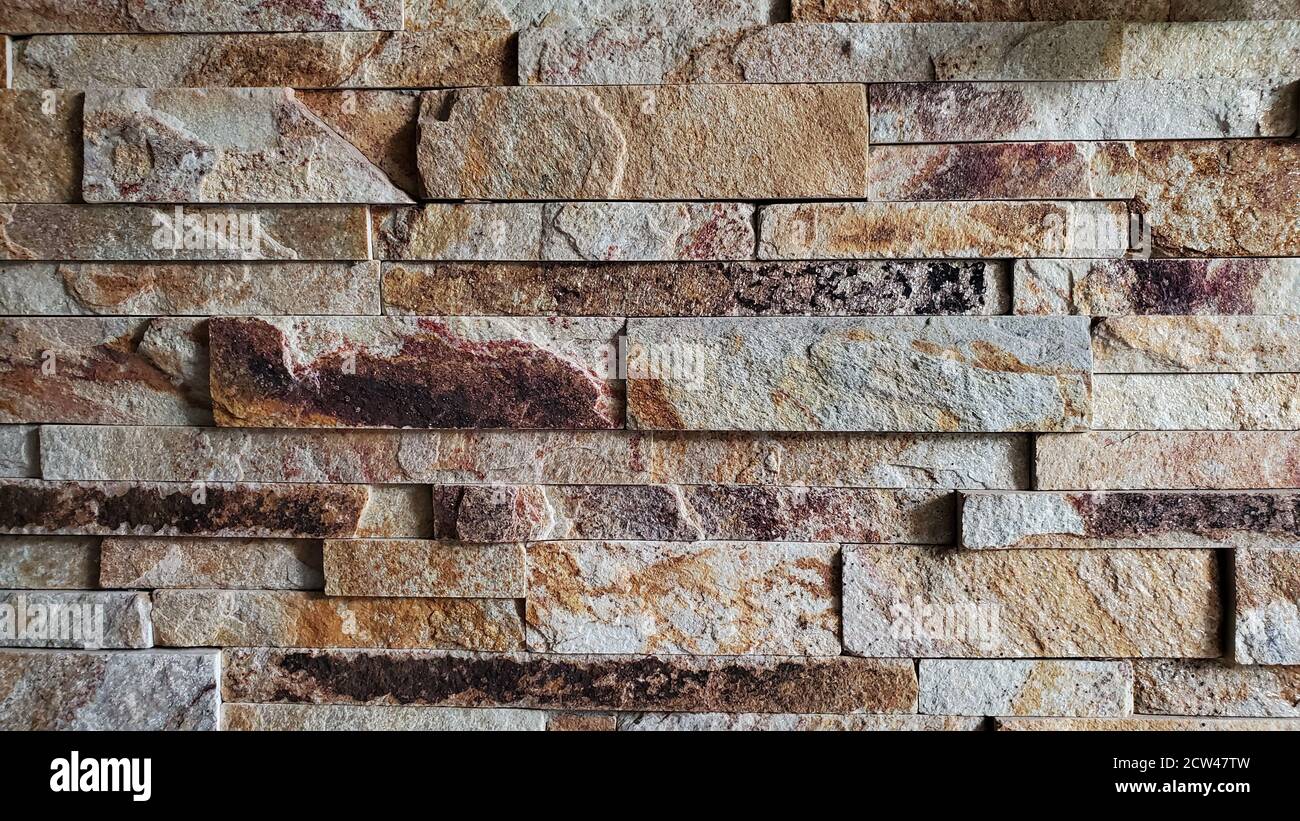 Rauer Stein Mauerwerk Wand Hintergrund mit Kopie Raum. Neutrale Farbtextur aus natürlichem Baumaterial. Architektonische Details Stockfoto