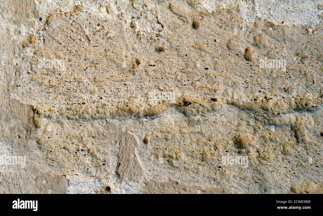 Textur einer Steinwand. Alte Burg Stein Wand Textur Hintergrund. Steinmauer als Hintergrund oder Textur. Teil einer Steinmauer für Hintergrund oder Text Stockfoto