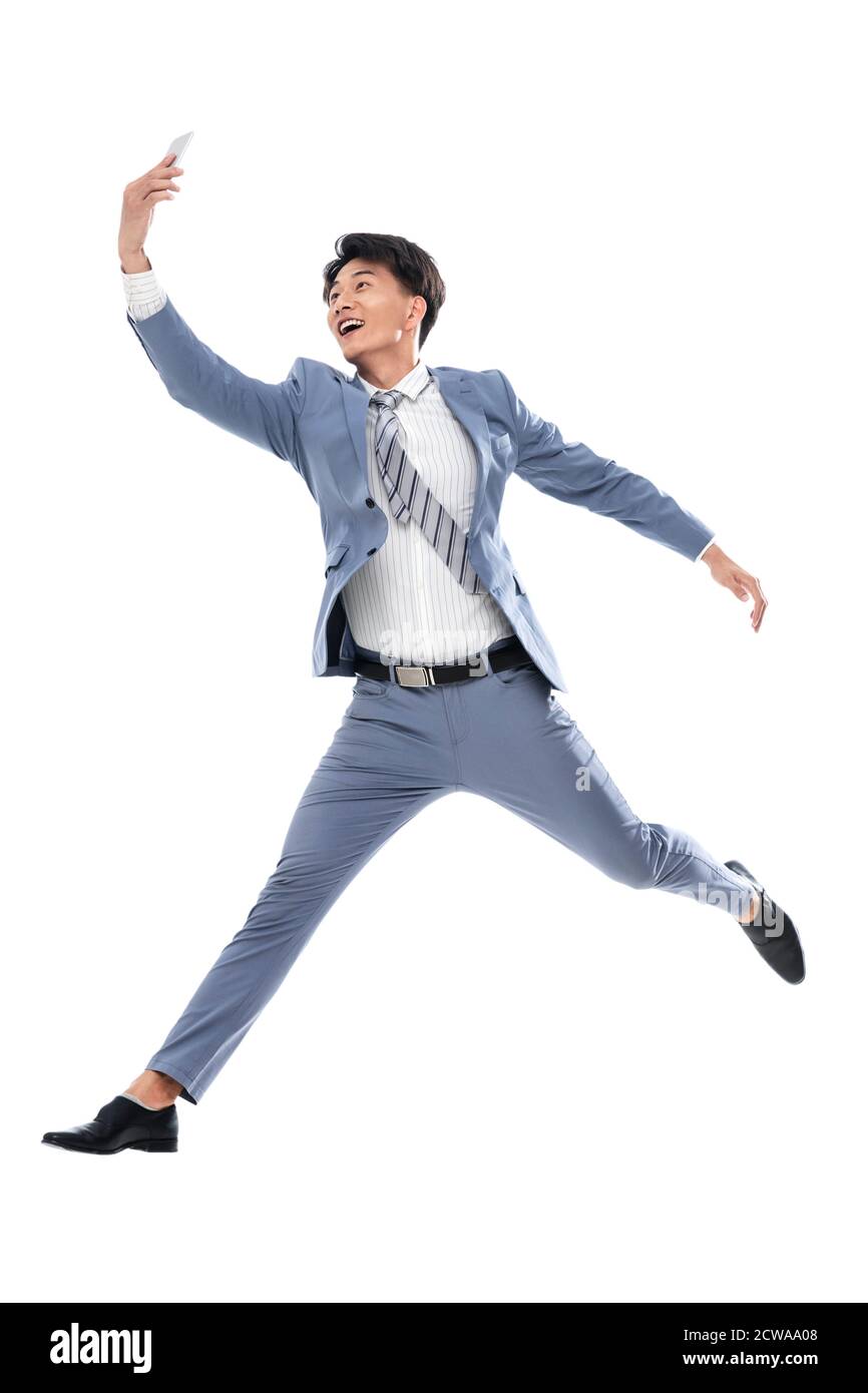 Holen Sie sich das Telefon laufen springen ein Geschäftsmann Stockfoto