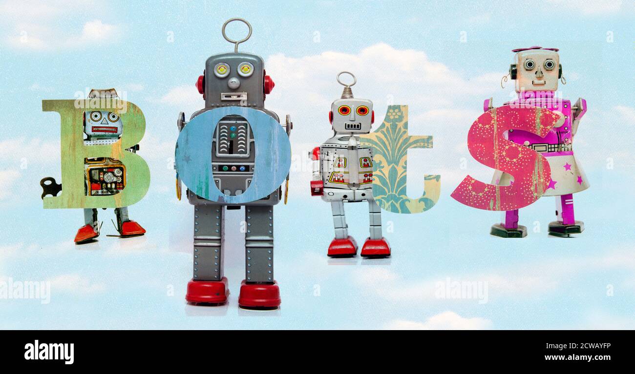 Retro Zinn Roboter Spielzeug halten die Wort BOTS Wolke Stockfoto