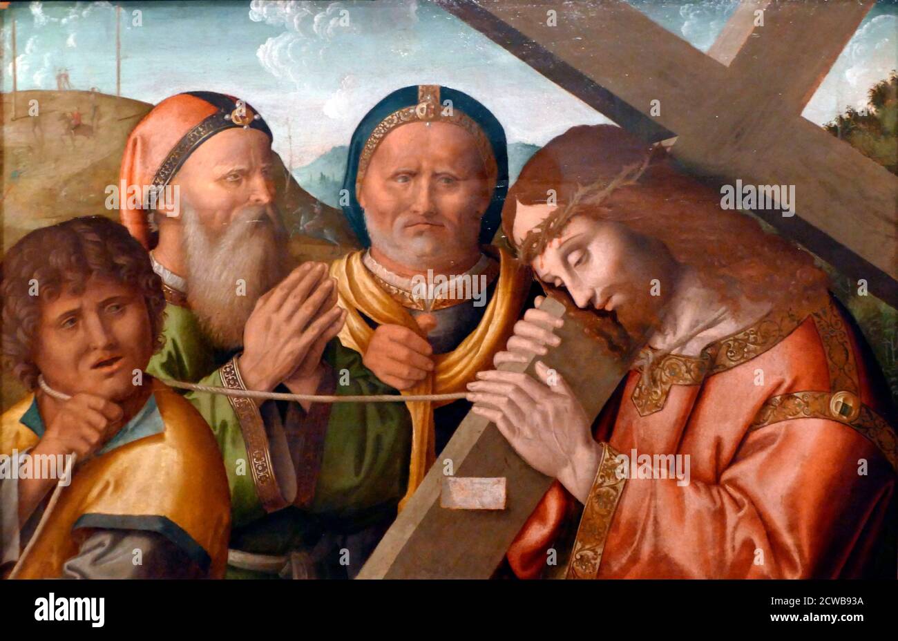 Christus, der das Kreuz trägt; 1535, von Marco Palmezzano (1460-1539) war ein italienischer Maler und Architekt, der der Malschule Forli angehörte, der in einem Stil malte, der frühere Modelle der nördlichen Renaissance erinnerte. Er war hauptsächlich in der Nähe von Forli aktiv. Stockfoto
