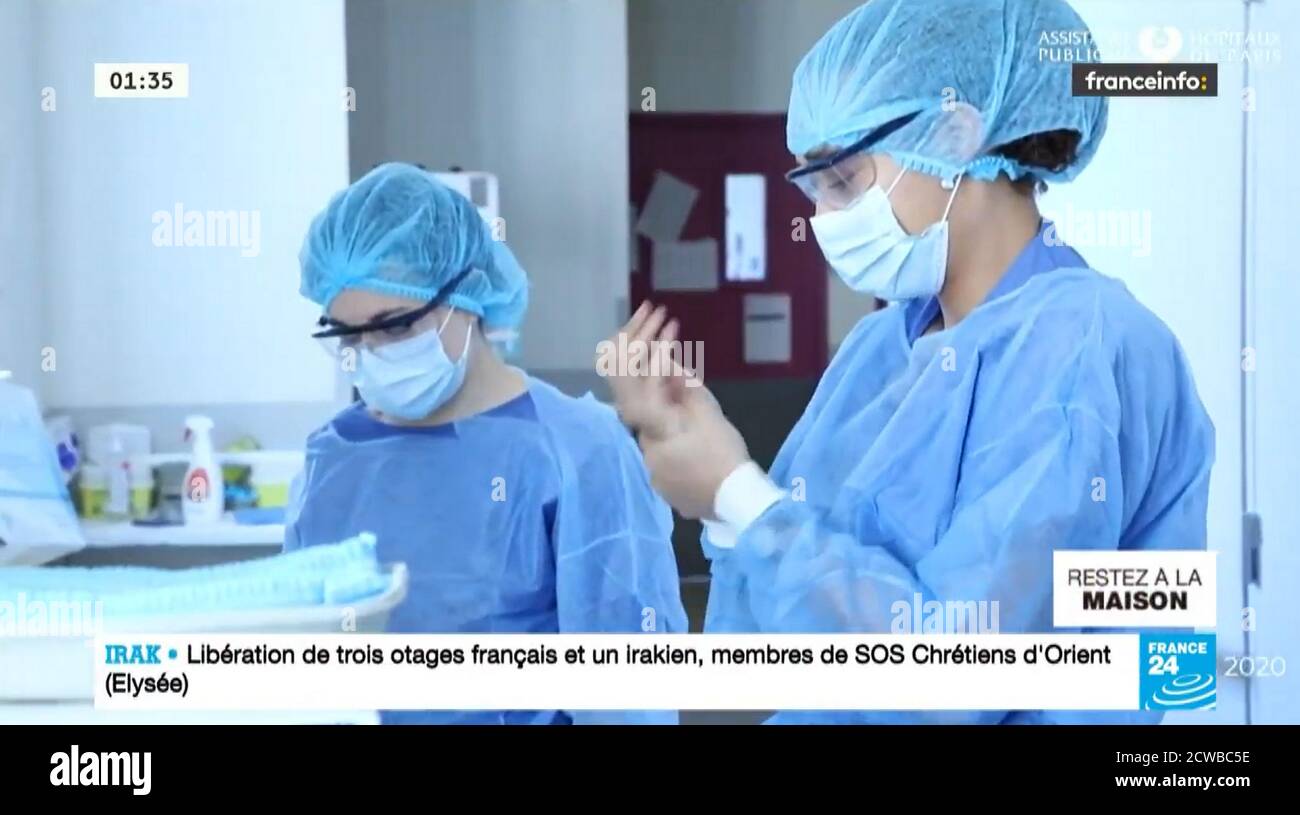 Fernsehnachrichten berichten über Krankenhäuser in Italien während der Corona Virus Pandemie. März 2020 Stockfoto
