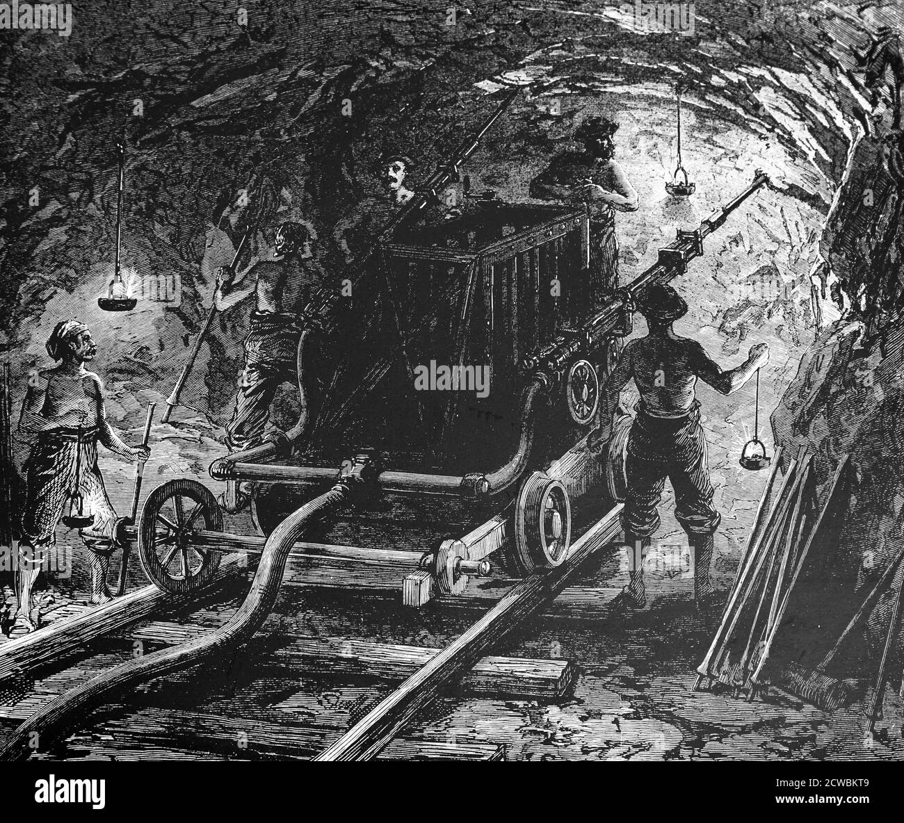 Gravur, die einen Druckluftbohrer darstellt, der beim Bau des Mont Cenis Tunnels zum Bohren von Gestein verwendet wurde. Stockfoto