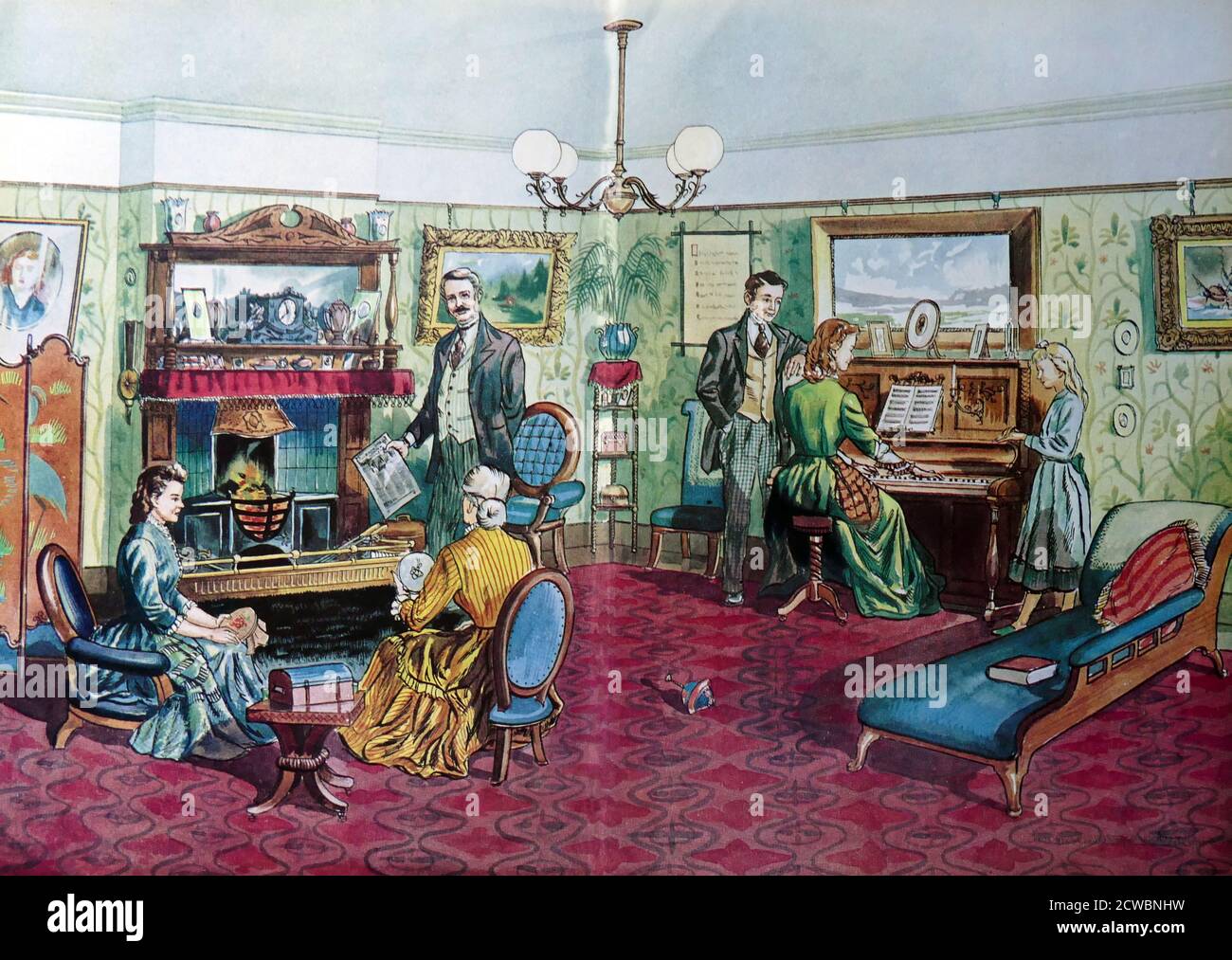 Abbildung zeigt ein viktorianisches Wohnzimmer mit Familie um ein Feuer und ein Klavier versammelt. Ende des 19. Jahrhunderts Stockfoto