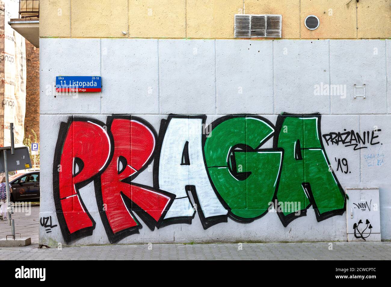 Wand mit Graffiti-Spruch Praga auf 11 Listopada Straße in der Praga Bezirk Warschau, Polen Stockfoto