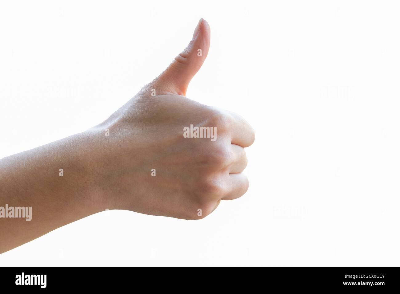 Junge Frauen Hand zeigt Daumen nach oben Zeichen, wie, isoliert auf weißem Hintergrund. Stockfoto