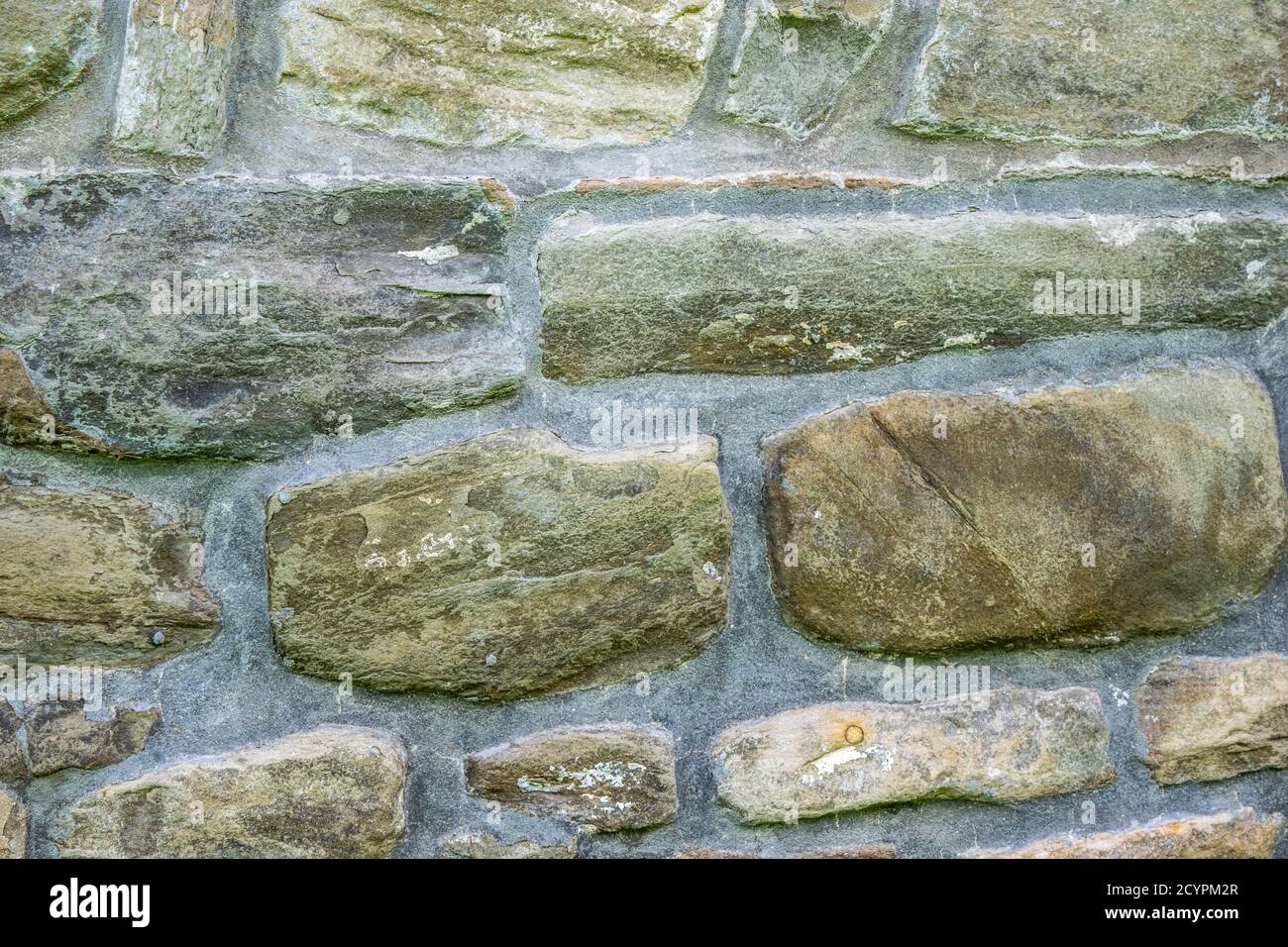 Struktur aus Mauerwerk, das Fragment einer Steinmauer eines antiken Tempels aus dem 10. Jahrhundert, Hintergrund, Hintergrund Stockfoto