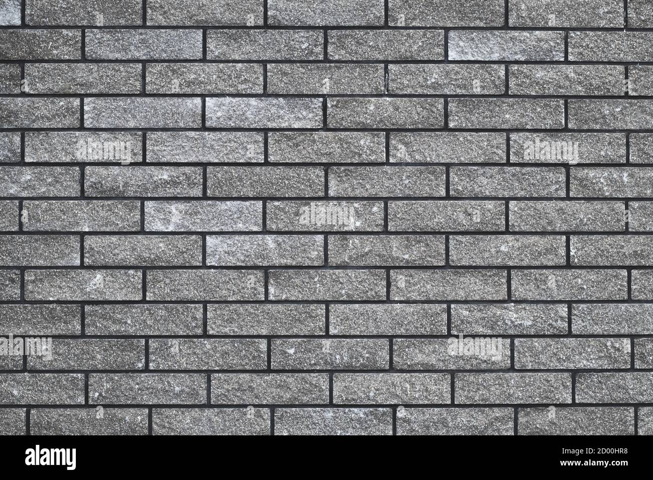 Ziegelwand Textur, nahtlose Steinmuster, graue Ziegelwand, abstrakt grauen Hintergrund, Stadtdesign. Haus Fassade Hintergrund. Dekorative Fliesen, Tapete. Stockfoto