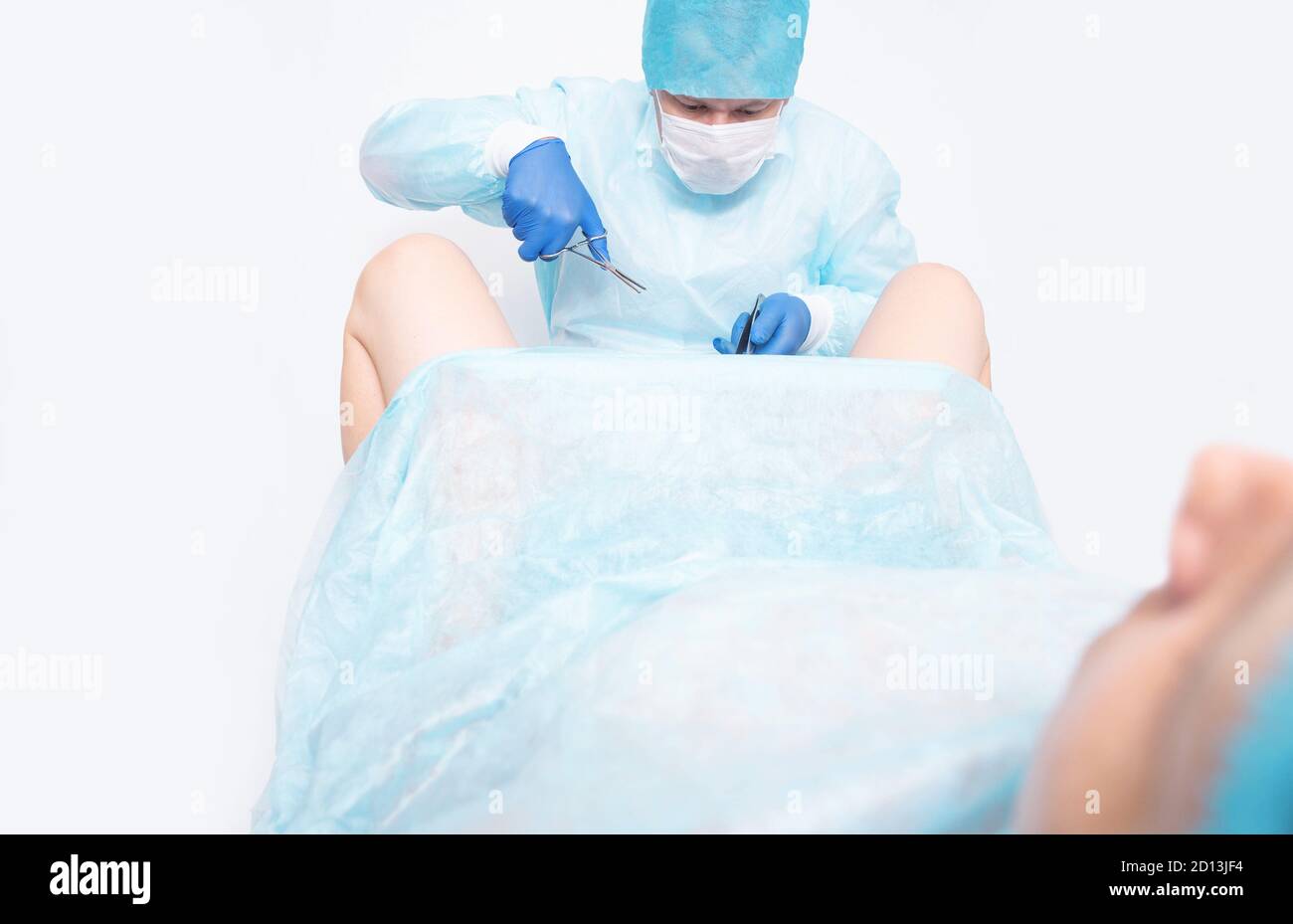 Eine Frau bei einem Gynäkologen Termin installiert eine Verhütungsspule auf der Gebärmutter als eine Methode der Verhütung gegen unerwünschte Schwangerschaft. Preventif Stockfoto
