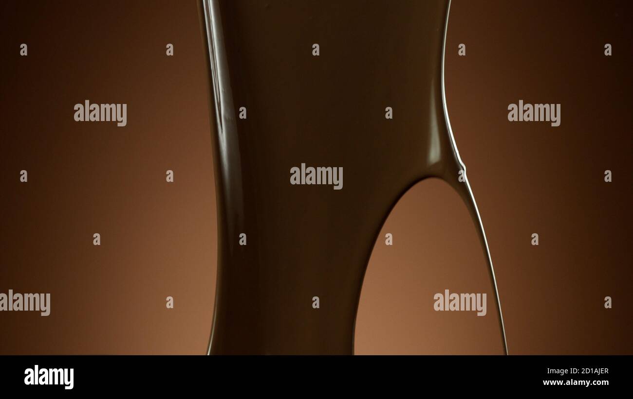 Abstrakte Form der schmelzenden Schokolade isoliert auf weichen Gradienten Hintergrund Stockfoto