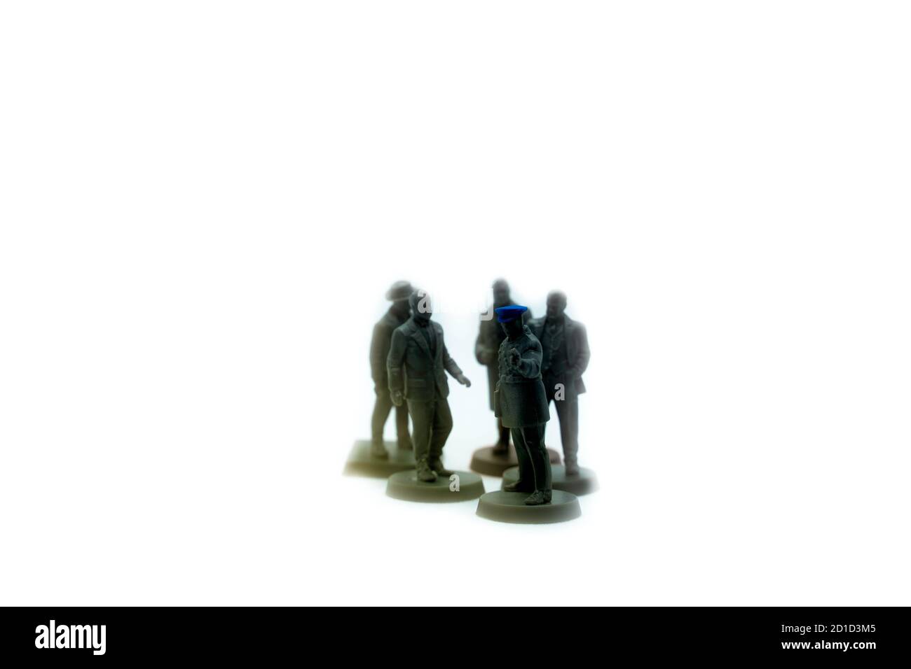 Darstellung der Führung mit Statuen von Männern in einer Gruppe Stockfoto