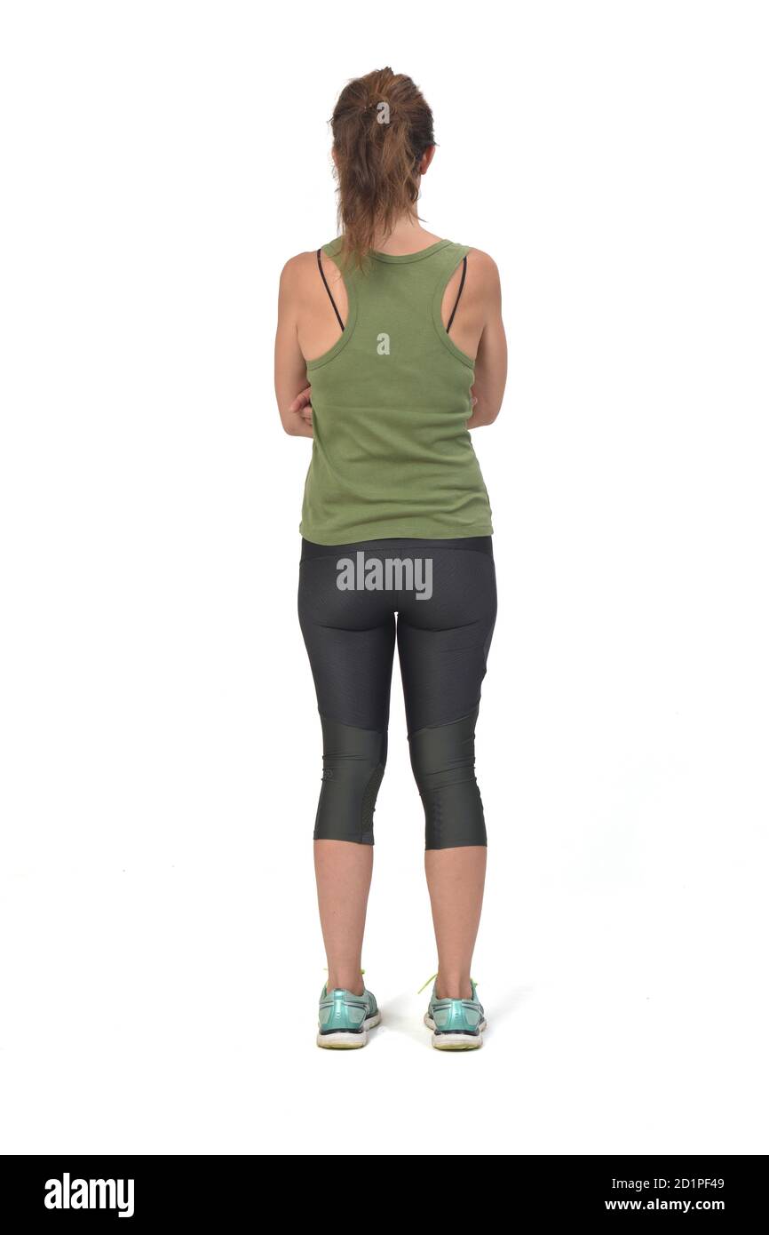 Rückansicht einer Frau mit Sportbekleidung auf weißem Hintergrund, Stockfoto