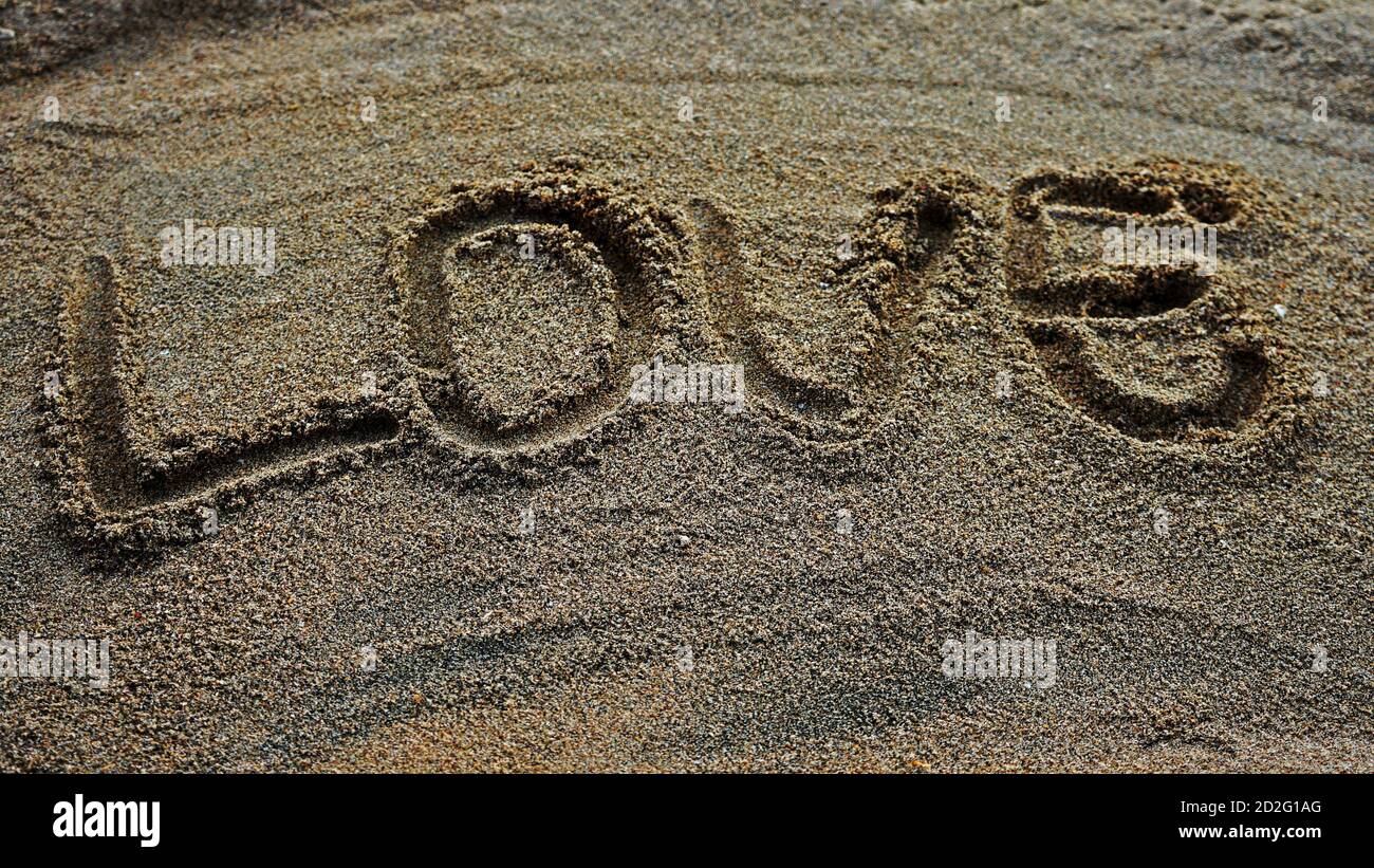 Die Aussicht, die Liebe sagt, ist Sand Stockfoto