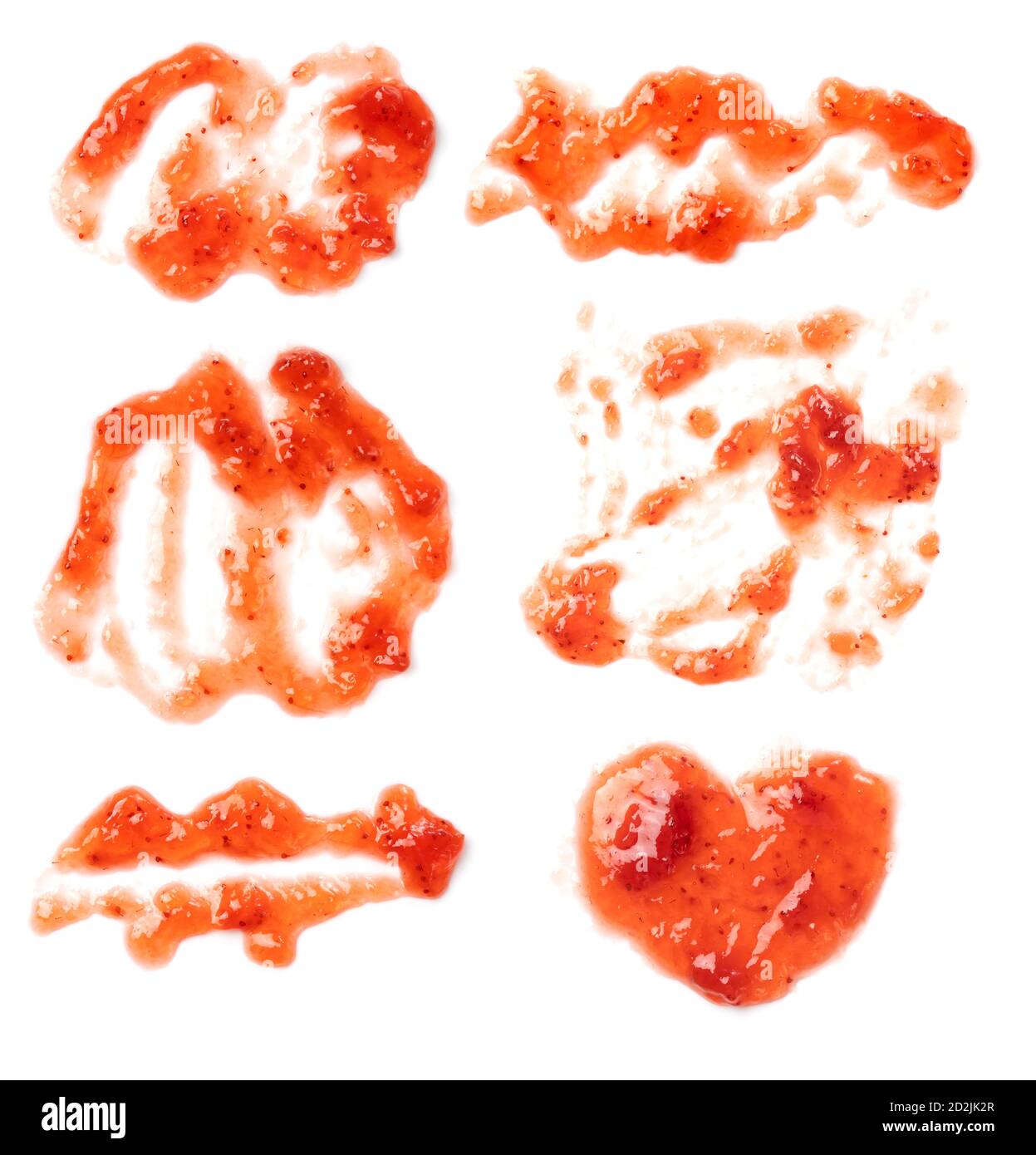 Ich nahm eine Vogelperspektive der verschiedenen Formen der Erdbeermarmelade, die auf den weißen Hintergrund tropfte. Stockfoto