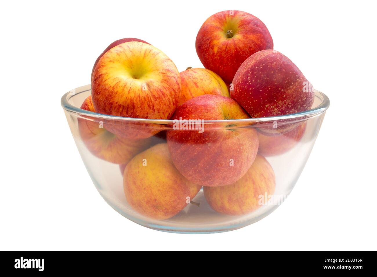 Bild von reifen roten Äpfeln liegen in einem großen Glas Platte Stockfoto