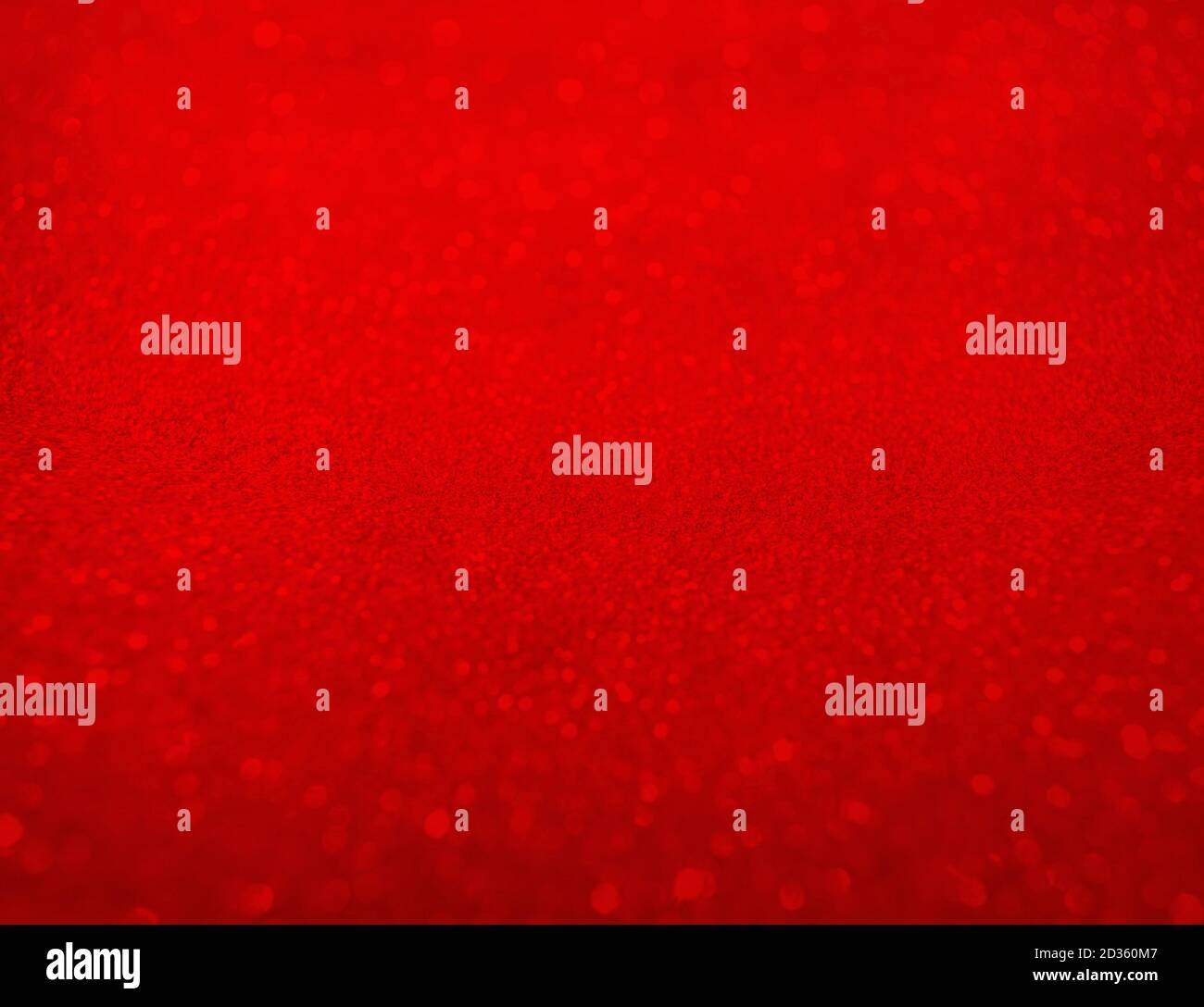 Glitzernder roter Hintergrund. Weihnachtsmaterial. Stockfoto