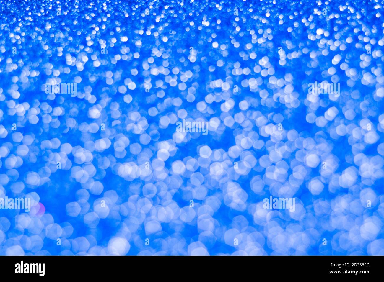 Abstrakt Sparkli Boke Hintergrund. Glitzernde und glänzende trendige Kulisse. Stockfoto