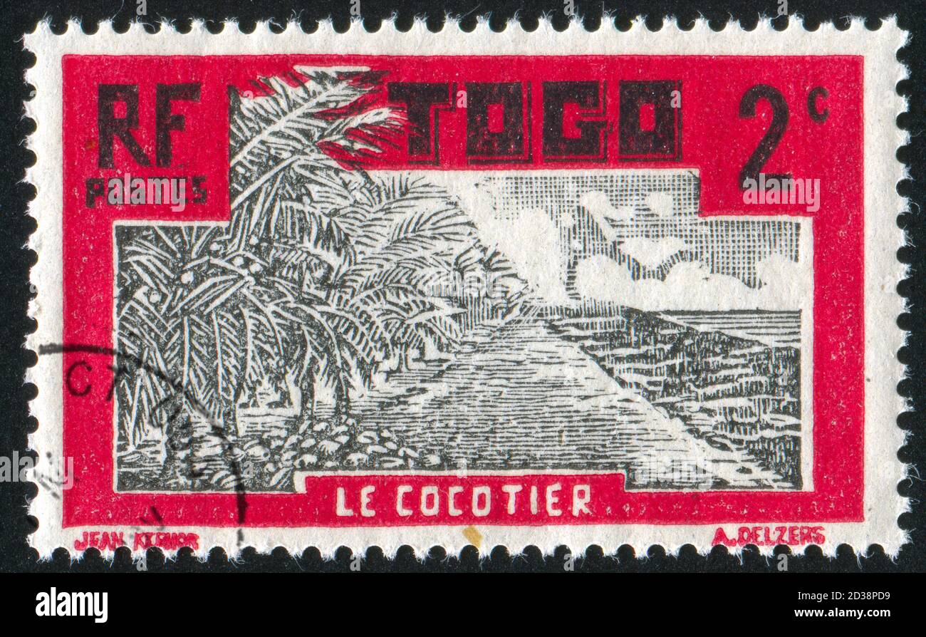 TOGO - UM 1931: Briefmarke gedruckt von Togo, zeigt Coconut Grove, um 1931 Stockfoto