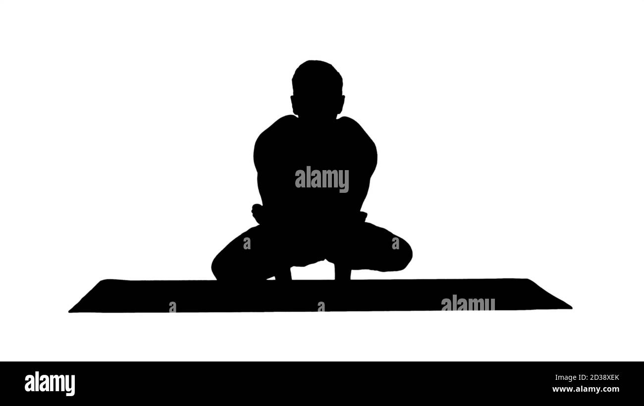 Silhouette Üben Yoga Übungen. Scale Pose - Tolasana Stockfoto