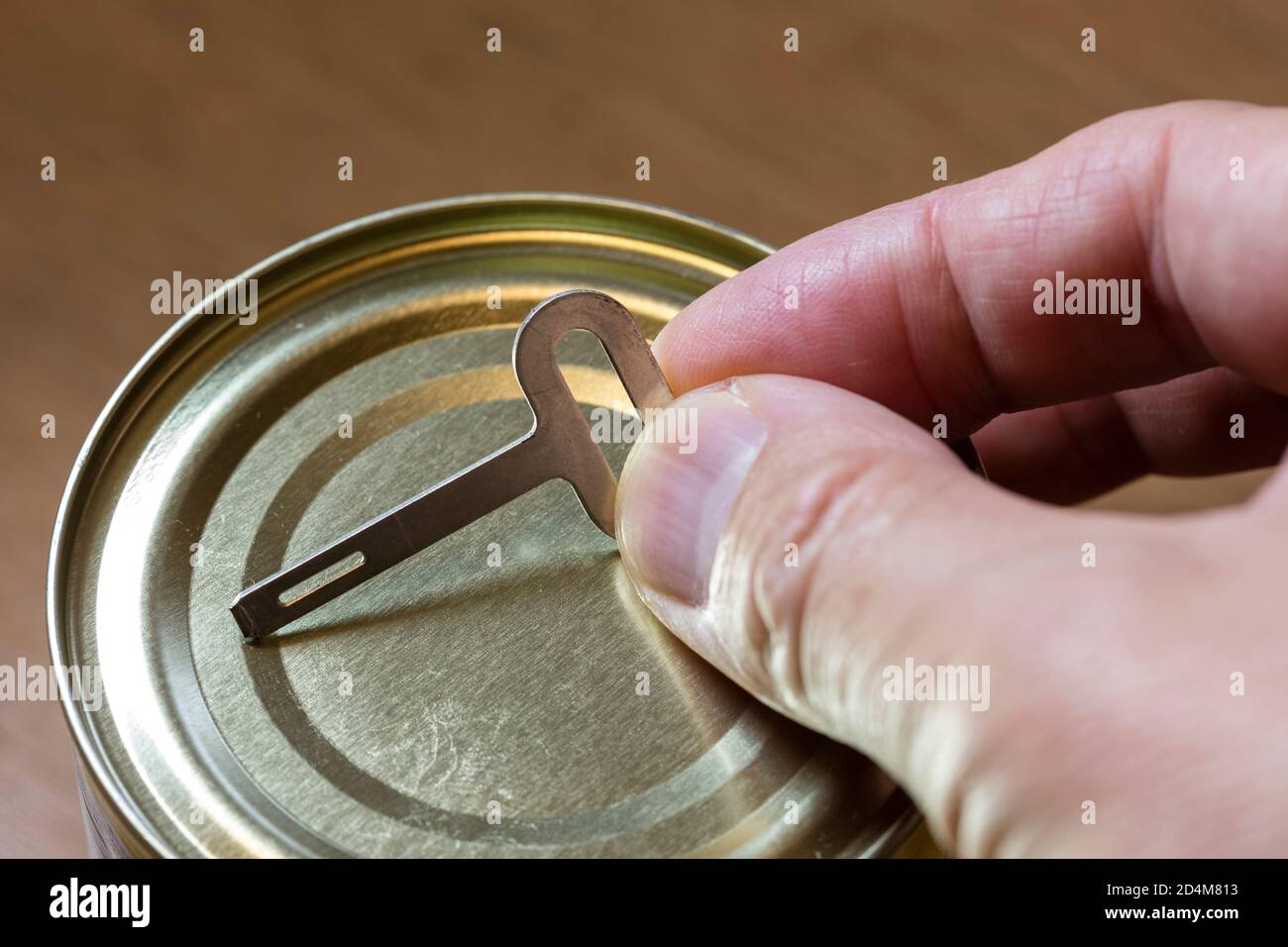 Alte Mode kann Öffner Schlüssel Nahaufnahme Stockfoto