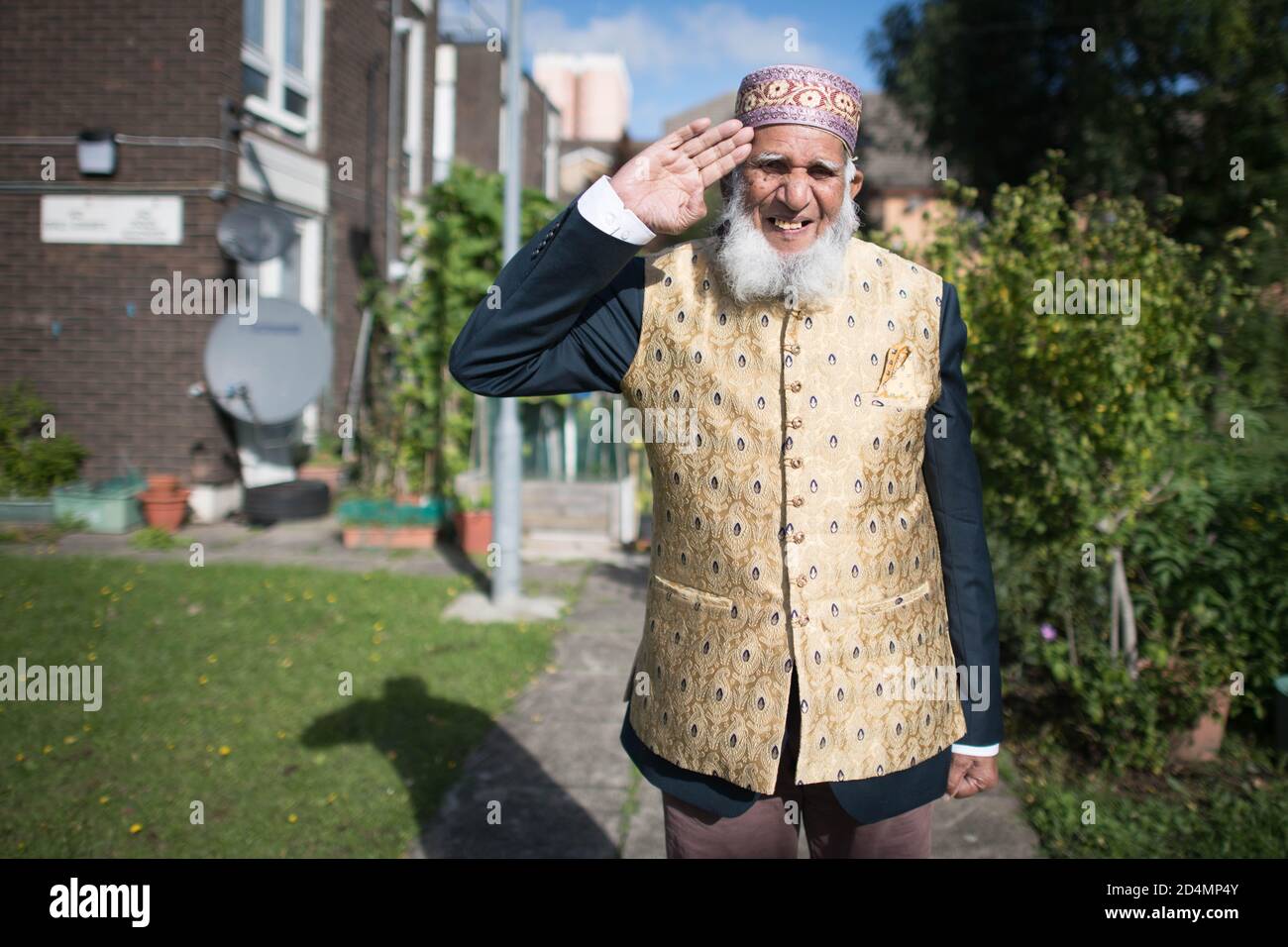Herr Dabirul Islam Choudhury, der während der Covid-19 mit dem OBE für wohltätige Zwecke ausgezeichnet wurde, fotografiert in seinem Haus in Bow, Ost-London. Stockfoto