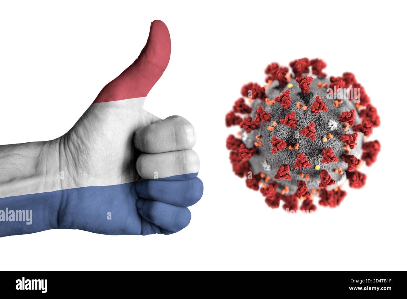 Niederlande Flagge auf menschlichen männlichen Daumen nach oben Hand während covid Stockfoto