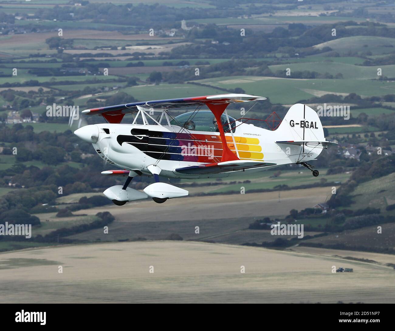 Air to Air Fotos des hochaerobatischen Christen Eagle Flugzeugs am Himmel über der Isle of Wight. Stockfoto