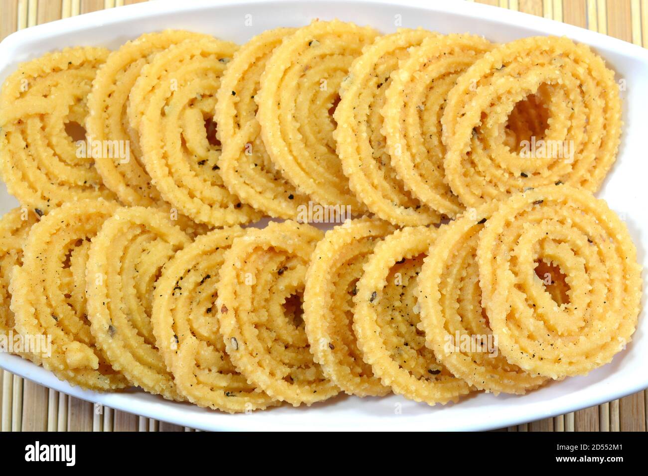 Murukku ist ein beliebter südindischer herzhafter und knuspriger Snack Vorbereitet während traditioneller Feste Stockfoto