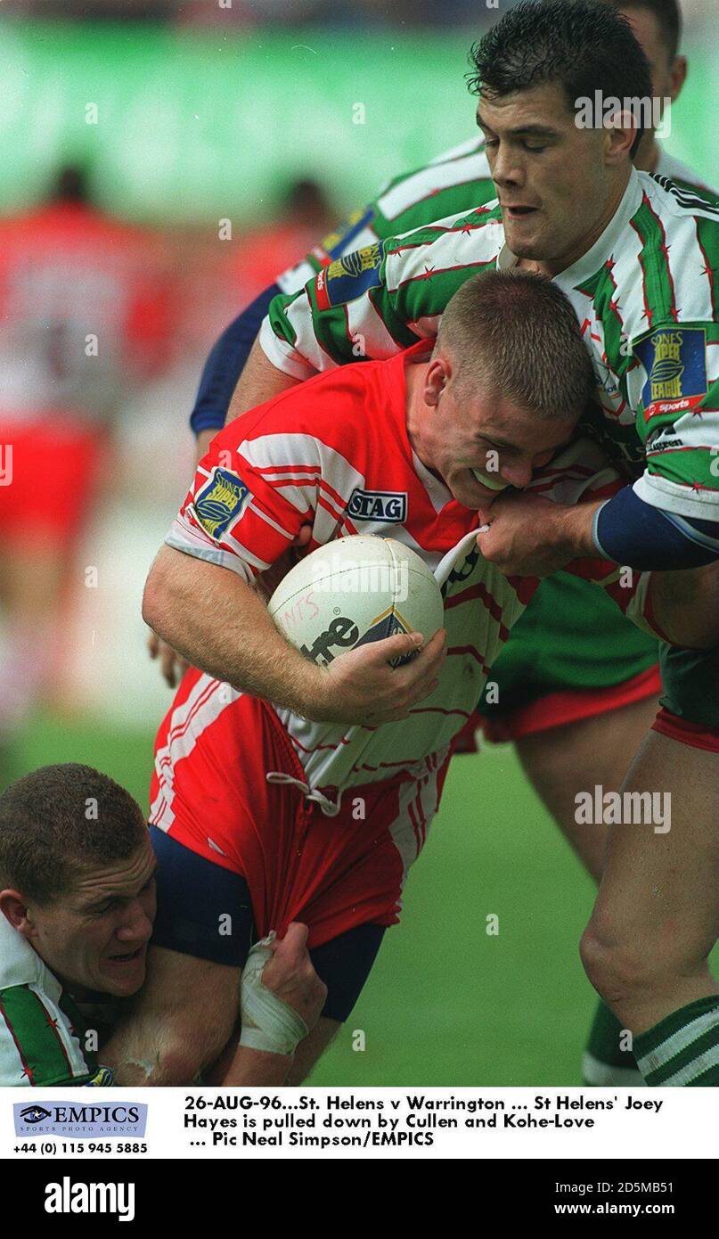 26-AUG-96. St. Helens / Warrington ... St. Helens' Joey Hayes wird von Cullen und Kohe-Love niedergerissen Stockfoto