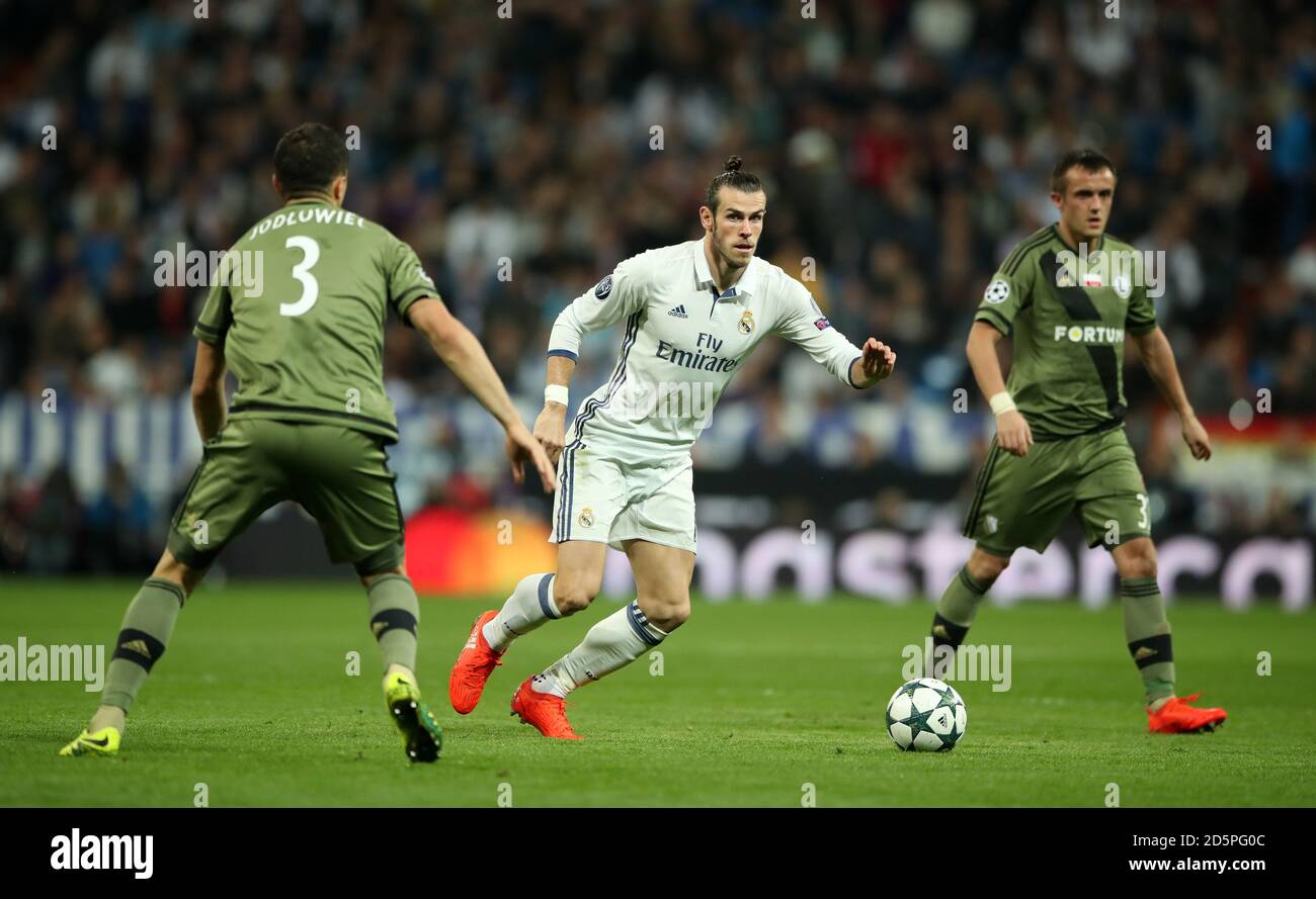 Tomasz Jodlowiec von Legia Warsaw, Gareth Bale von Real Madrid und Miroslav Radovic von Legia Warsaw Stockfoto