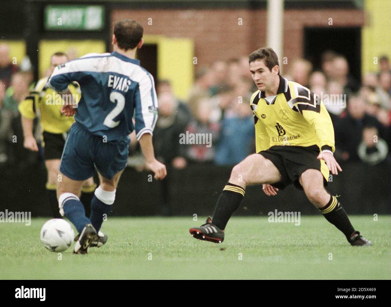 Burton Albion Manager Nigel Clough jagt Wayne Evans von Rochdale Stockfoto