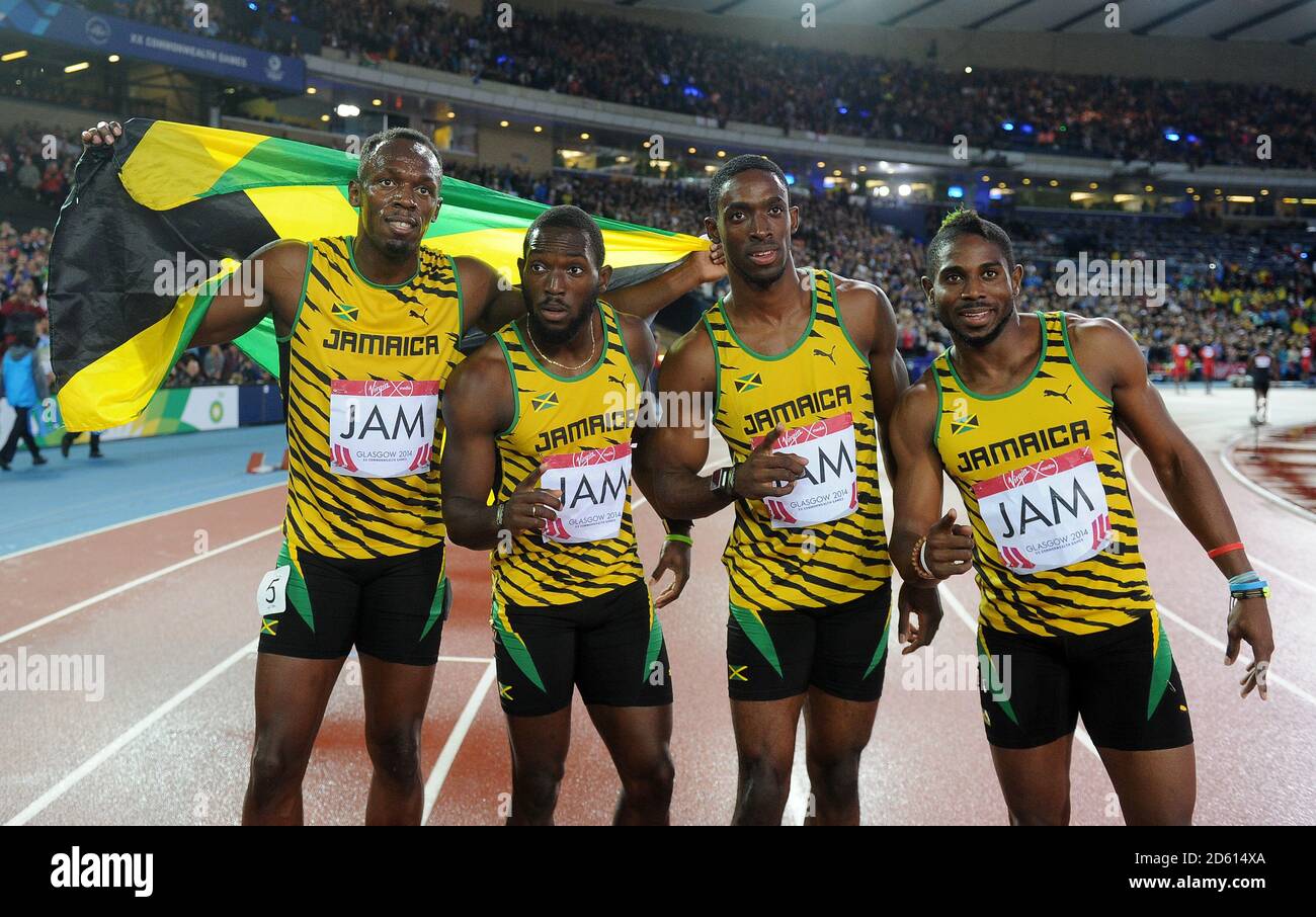 Datei Foto: Usain Bolt probiert für die australische Fußballmannschaft Central Coast Mariners aus. Jamaikas (von links nach rechts) Usain Bolt, Nickel Ashmeade, Kemar Bailey Cole und Jason Livermore feiern den Gewinn der Männer 4x100m Staffel ... Sport - 2014 Commonwealth Games - Tag Zehn ... 02-08-2014 ... Glasgow - Hampden Park ... Vereinigtes Königreich ... Bildnachweis sollte lauten: EMPICS Sport / EMPICS Sport. Eindeutige Referenz-Nr. 20559040 ... Stockfoto