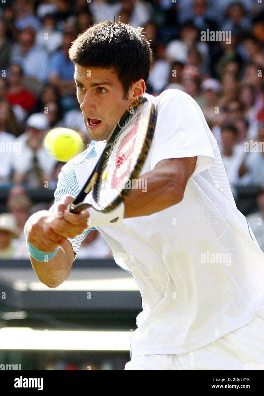 Novak Djokovic im Kampf gegen Michael Berrer Stockfoto